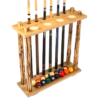 Freestanding wooden pool cue rack with six cues and billiard balls stored below.