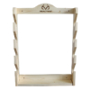 Wall-mounted wooden gun rack with four horizontal slots.