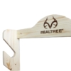 Natural wood wall gun storage rack with Realtree branding.