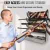 Wall-mounted rack holding rifles horizontally on a white brick wall for easy access and secure storage.