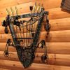 394008F Holds compound bows, recurve bows, and accessories in one rack.