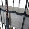 Double-sided rolling rack with padded grooves to protect rods and handles