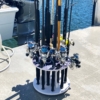 Durable 12 rod fishing pole holder rack with 360° rotation, extra space for large reels and easy assemble fishing rod storage.