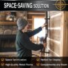 385015 space saving Man placing a rifle on the space-saving Rush Creek Creations metal 1-gun wall rack in a rustic cabin setting.